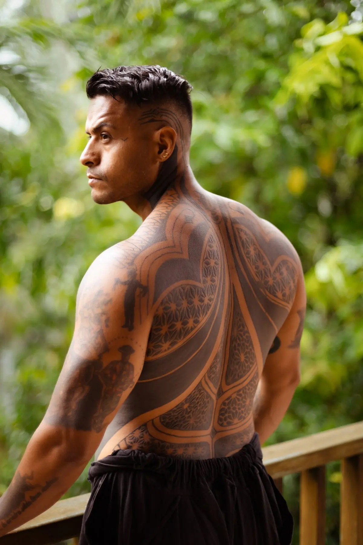 Large geometric Polynesian tribal back and shoulder piece in solid black