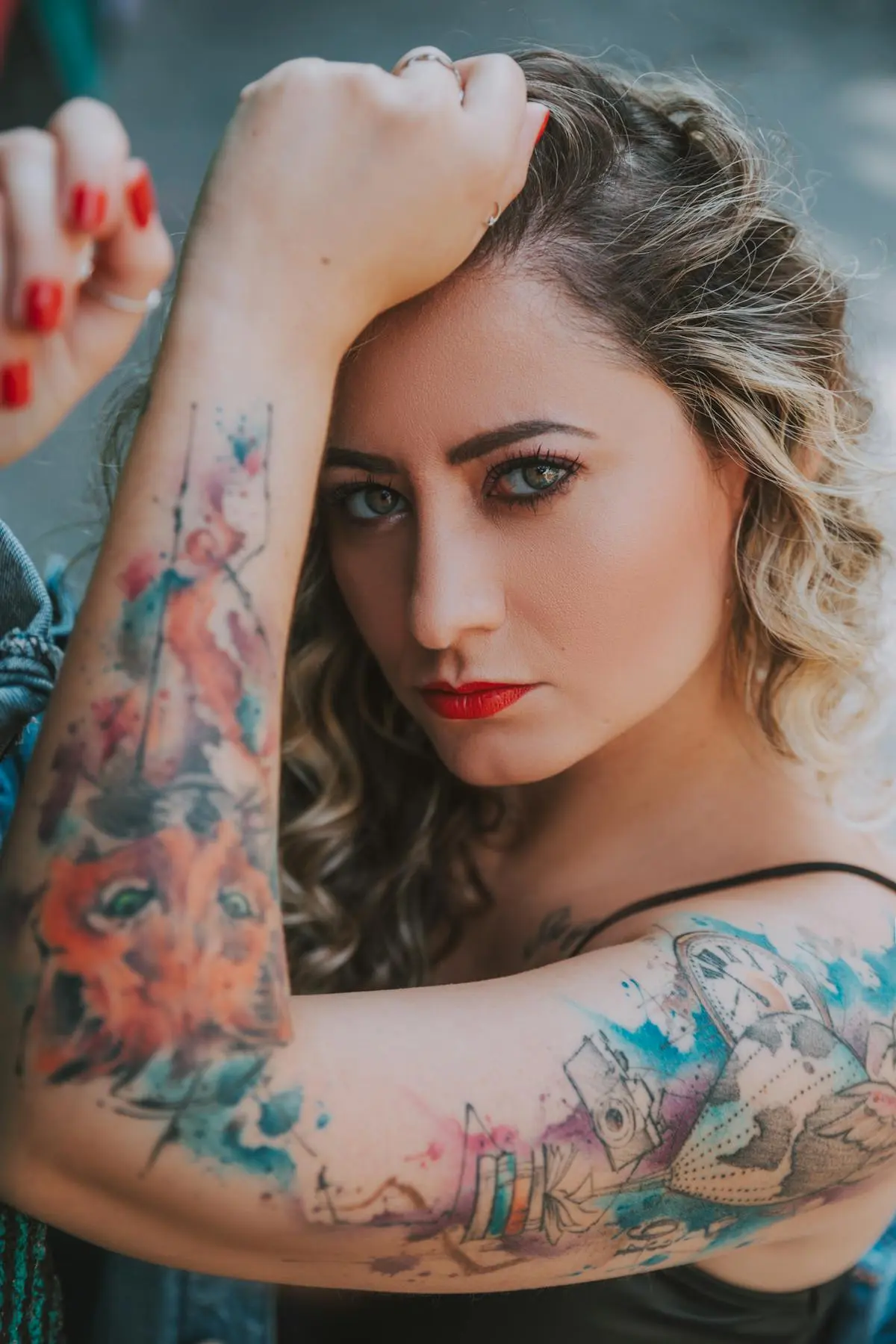 Watercolor-style sleeve with blue, orange and pink color washes and ink splatters